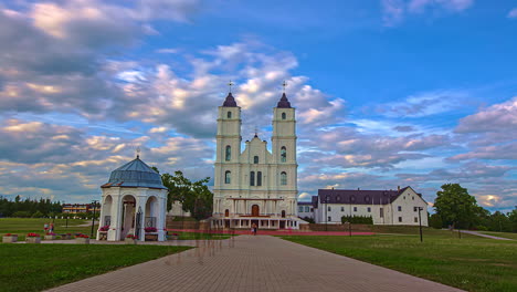 Sunset-timelapse-video-of-Aglona-Roman-Catholic-Basilica-of-the-Assumption-of-the-Blessed-Virgin-Mary-in-Aglona,Latvia-with-locals-coming-to-pray