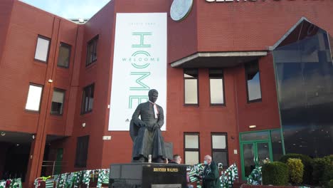 A-wide-shot-of-the-statue-of-Celtic-Fc-founder,-Brother-Walfrid-outside-Parkhead