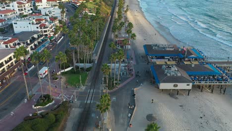 Slow-static-aerial-reveal-over-the-railroad-tracks-in-San-Clemente,-California