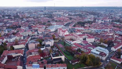 Aerial-circling-over-Vilnius-old-town,-Lithuania