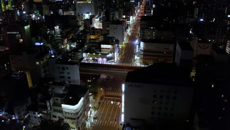 Osaka-Shinsaibashi-Downtown,-High-Aerial-Tilt-Reveal,-Japan