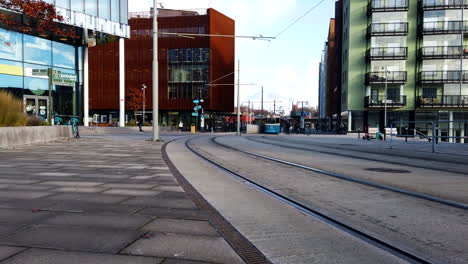 Tramway-timelapse-at-Gamlestaden-during-the-day,-Low-angle