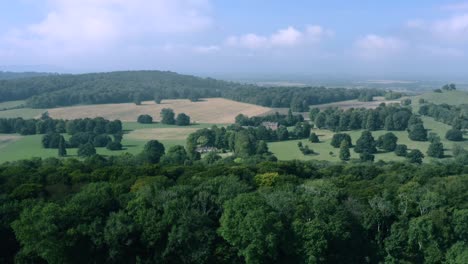 Aerial-landscape-shot-of-beautiful-rolling-hills-in-English-countryside