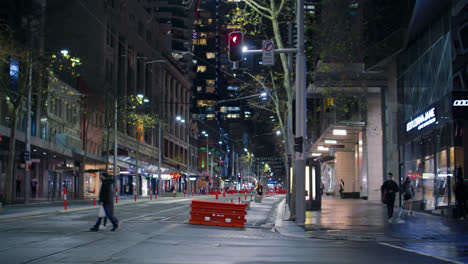 Crossing-At-The-George-Street-With-Tramway-Track-At-Night-In-Sydney-CBD,-NSW,-Australia