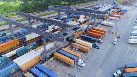 4K-Drone-Video-of-Trains-and-Trucks-at-CSX-Intermodal-Train-Yard-in-Winter-Haven,-FL