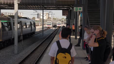 Metro-Train-Arriving-Station-Platform-Passengers-Departing-and-Boarding-Perth-Australia