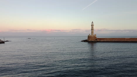 Lighthouse-in-port-with-sunset