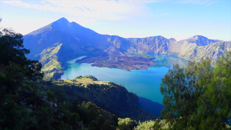 Volcanic-Lake-top-of-Mt-Ranjani-Lombok-Indonesia-Bali-Timelapse-peaceful-sunrise-cloud-passing-by-mountain-scape-Volcano