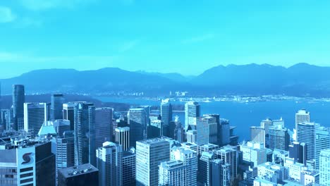 Vancouver-Downtown-Drohnenüberflug-Finanzviertel-Kohlehafen-Neben-Fortune-500-Unternehmen-In-Kanada,-Die-Die-Outdoor-Bootstankstelle-Neben-Dem-Stanley-Park-Canada-Place-Auf-Der-Anderen-Seite-Des-Lonsdale-Quay-Beaufsichtigen
