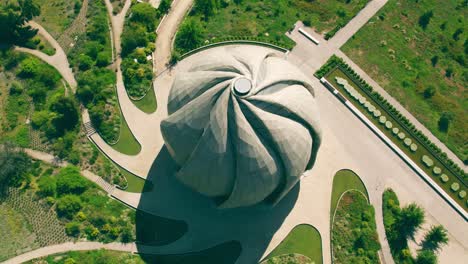 Overhead-boom-up-view-of-the-spiral-design-of-the-Bahai-Temple-of-South-America-on-a-lonely-day,-Santiago,-Chile