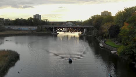 Flying-over-a-Mississauga-river-with-boats-and-kayakers