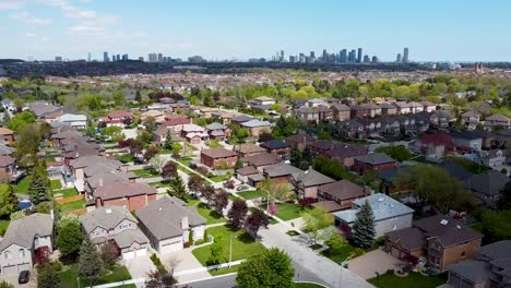 Aerial-view-flying-over-sunny-Mississauga-houses-on-a-summer-day