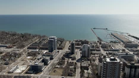 Aerial-shot-circling-over-Mississauga-lakeshore-in-winter