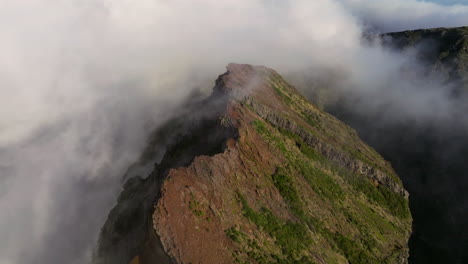 Flying-Through-Clouds-Covering-In-Pico-Do-Areeiro,-Madeira-Island,-Portugal