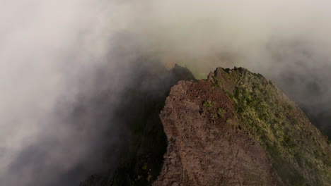 Mountain-Peaks-Of-Pico-do-Arieiro-In-The-Clouds-On-Portuguese-Island-Of-Madeira---aerial-drone-shot
