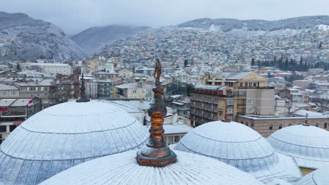 Magnificent-Bursa-Mosque-Domes-Covered-With-Snow-In-Turkey