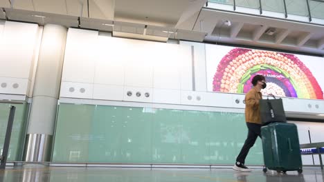 Travel-flight-passengers-are-seen-at-the-arrival-hall-after-landing-in-Hong-Kong's-Chek-Lap-Kok-international-airport