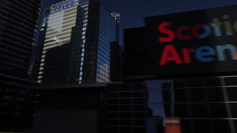 A-wide-exterior-tracking-shot-of-Scotiabank-Arena-exterior-building-logos