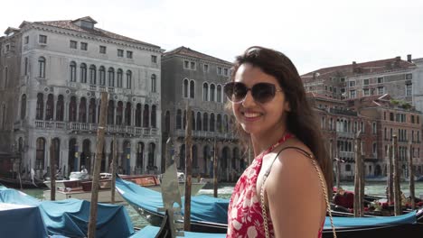 Portrait-Of-A-Happy-South-Asian-Woman-Travel-In-The-Historic-Town-Of-Venice,-Italy