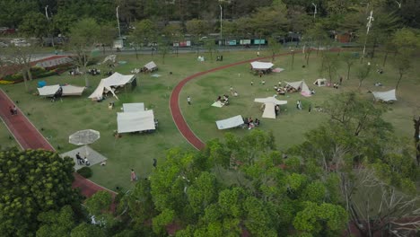 Big-picnic-camping-tents-in-recreation-park-on-a-weekend-afternoon