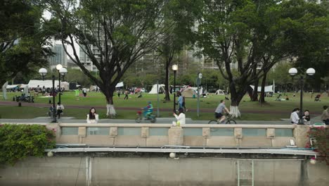 People-gathering-for-an-event-in-Linjiang-Linear-Park-in-Guangzhou,-China
