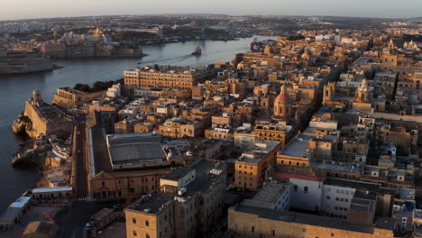 Skyline-Of-Valletta-At-Sunset-In-Malta---aerial-drone-shot