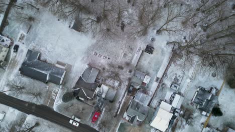 Top-Down-View-a-Neighborhood-with-a-light-dusting-of-snow-covering-everything