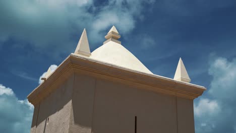 Close-up-shot-of-the-top-of-a-small-chapel-from-the-center-of-the-historic-tourist-attraction,-fort-of-the-Three-Wise-Men,-in-the-capital-city-of-Natal-in-Rio-Grande-do-Norte,-Brazil-on-a-summer-day