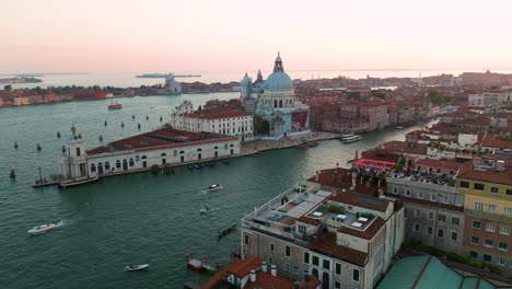 Panoramic-Aerial-View-Of-Santa-Maria-della-Salute-Basilica-During-Sunset-In-Venice,-Italy