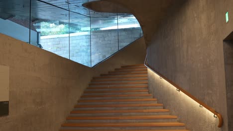 Famous-staircase-at-JC-Contemporary-at-Tai-Kwun-in-Hong-Kong,-tilt-up