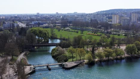Beautiful-city-park-with-lake-and-bridge