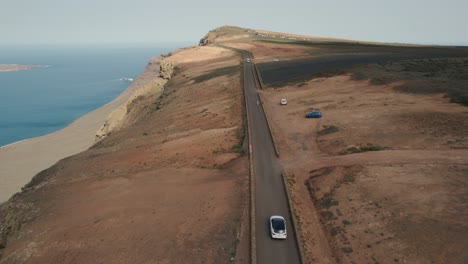 Driving-car-on-the-road-on-the-island-of-Lanzarote-in-the-Canary-Islands