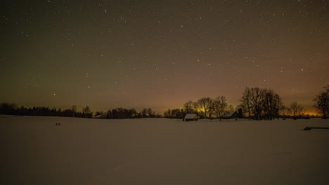 Magical-Milky-Way-Galaxy-spin-on-night-sky-in-winter-rural-landscape,-fusion-time-lapse