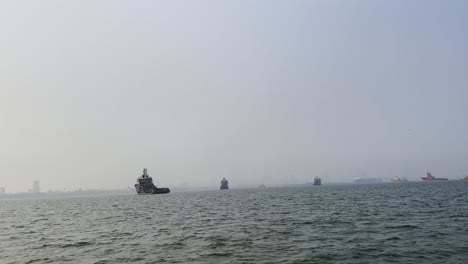 A-shot-of-the-sea-filled-with-various-boats-taken-from-a-moving-boat