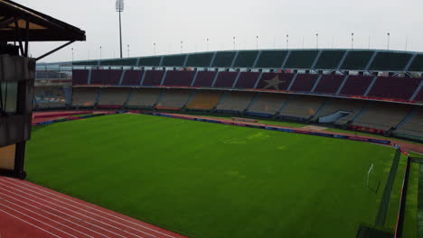 Ascending-aerial-view-inside-the-Amadou-Ahidjo-stadium,-in-Yaounde,-Cameroon,-Africa