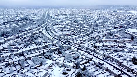 Beautiful-aerial-of-London-winter,-snowy-landscape