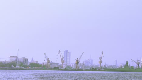 A-shot-of-the-Mumbai-harbor-from-the-sea-where-we-can-see-the-idle-cranes