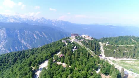 Vogel-Mountain-in-Julian-Apls-Slovenia,-Triglav-National-Park-Aerial-View-during-Clear-Warm-Daylight,-Establishing-Shot