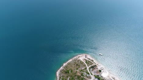 Tip-of-the-Bay-in-Croatian-Beach-Pula-Sea-Turquoise-Calm-Water-Aerial-View-Above-Rakalj-Coastline,-Travel-Holiday-European-Summer-Destination