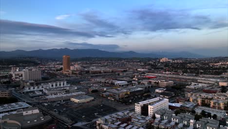 Aerial-of-industrial-area-of-East-Los-Angeles-With-Twilight-Blue-hour-Skies-After-Sunset