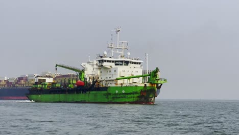 A-view-of-a-large-green-ship-in-the-Arabian-sea