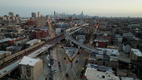 Still-drone-shot-of-a-train-and-traffic-in-Wrigleyville,-sunrise-in-Chicago,-USA