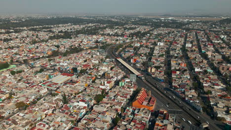 Stunning-view-of-mexico-city's-downtown-and-multi-lane-highways-from-above