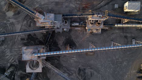 Overhead-aerial-view-of-conveyor-system-at-gravel,-sand,-and-crushed-stone-mine-in-Clarksville-Tennessee