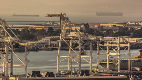 Huge-ships-anchored-in-the-San-Francisco-Bay-beyond-the-cargo-terminal---time-lapse