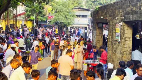 A-overview-shot-of-a-crowed-street-in-Mumbai-filled-with-people-street-vendors-and-tourists