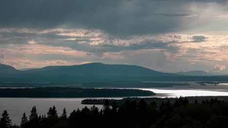 Mountain-view-over-lake-with-sunstrokes-in-Sweden