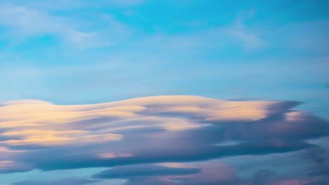 Majestic-clouds-moving-in-sky-during-sunset,-fusion-time-lapse