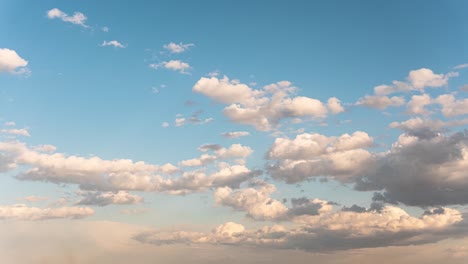 Timelapse-of-cloudy-sky,-from-bright-day-to-golden-hour
