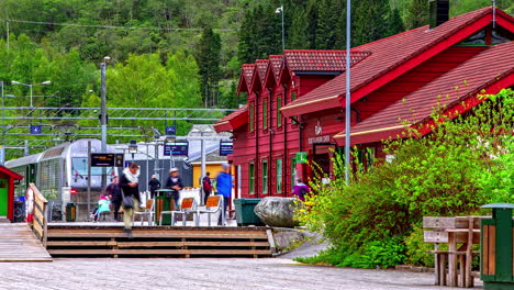 Timelapse-of-travellers-moving-on-the-platform-of-Flame-station